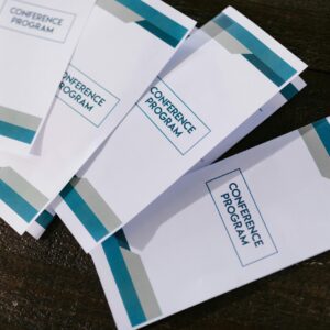 Conolly Printed Fliers Business paper Sheets and Pamphlets on a dark background